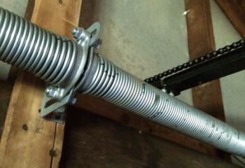 Newly installed garage door spring in a Casselberry home, ensuring smooth door function.